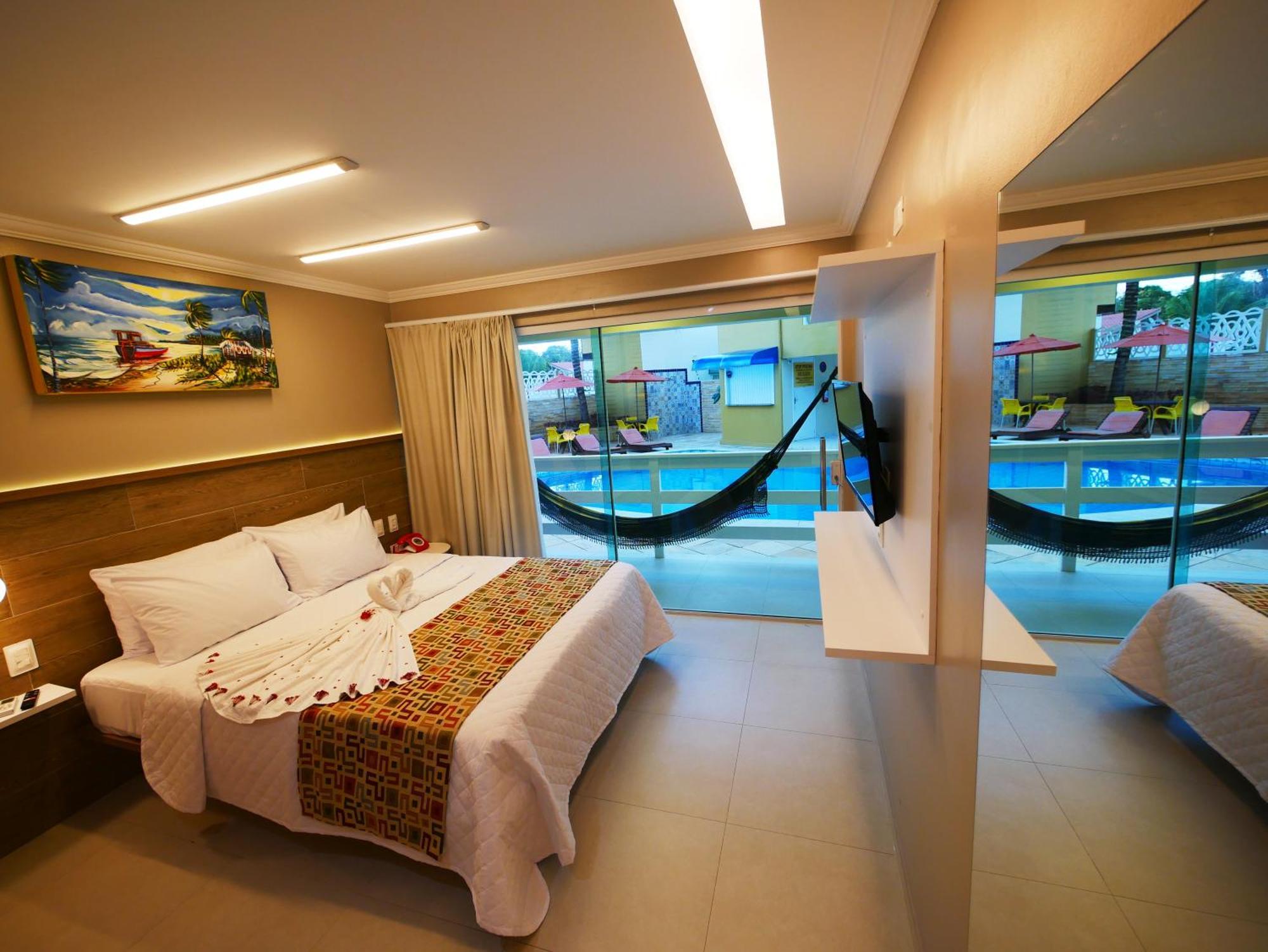 Master Casal com Varanda Vista Piscina,1282843564:JPEG